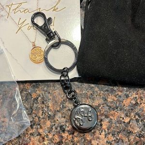 Brand new Invisawear black keychain
